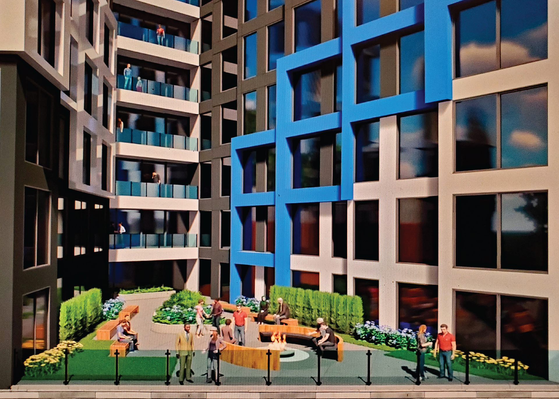 A group of people are standing outside of a building.