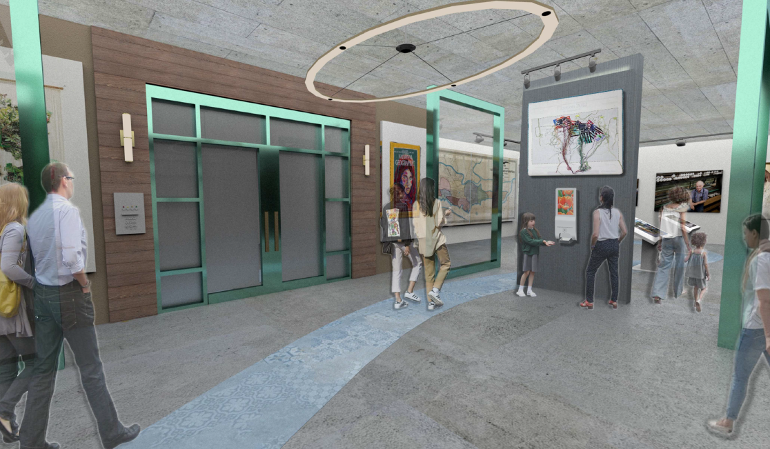 A group of people are walking through a museum.