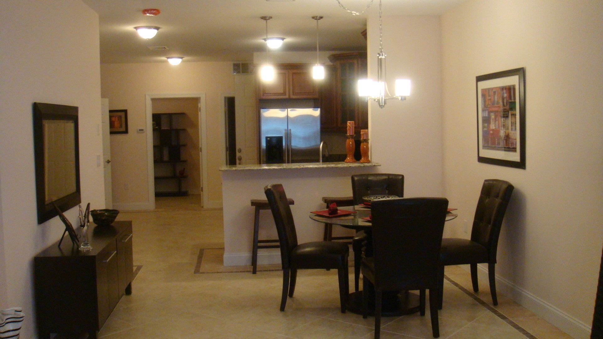 dining area with kitchen in background