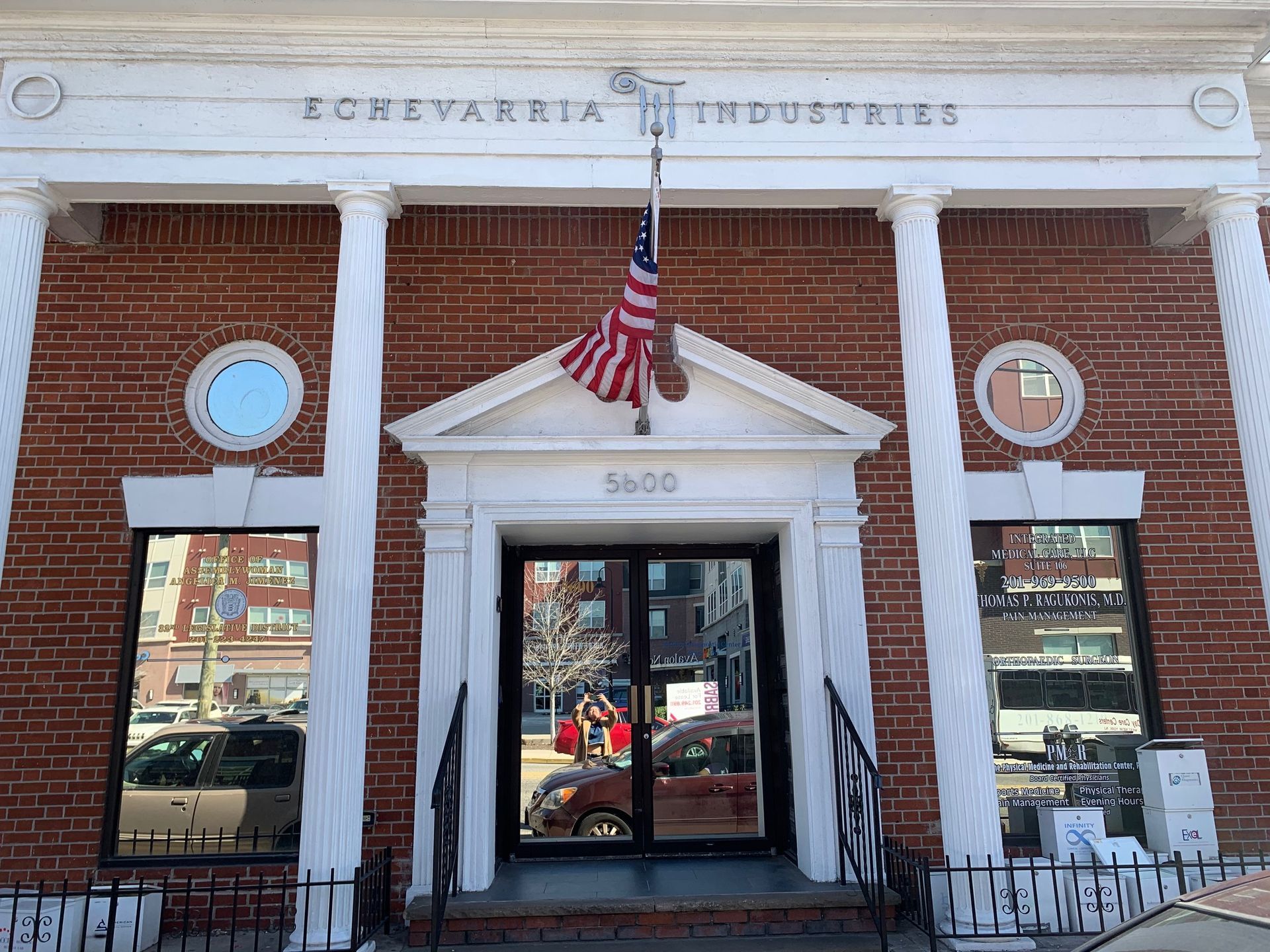 A brick building with the word achevarria industries on it
