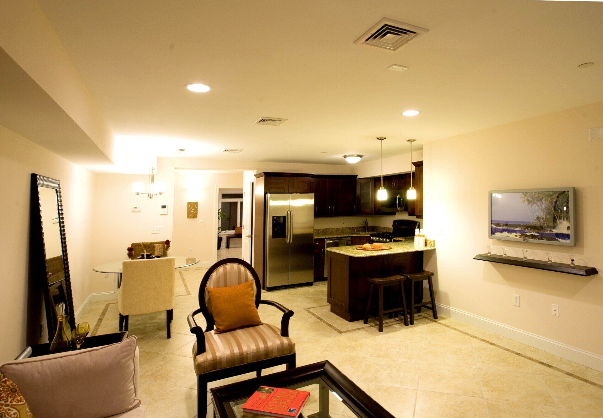 A living room filled with furniture and a flat screen tv