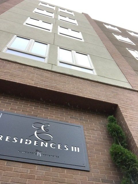 view of building taken from ground level looking up