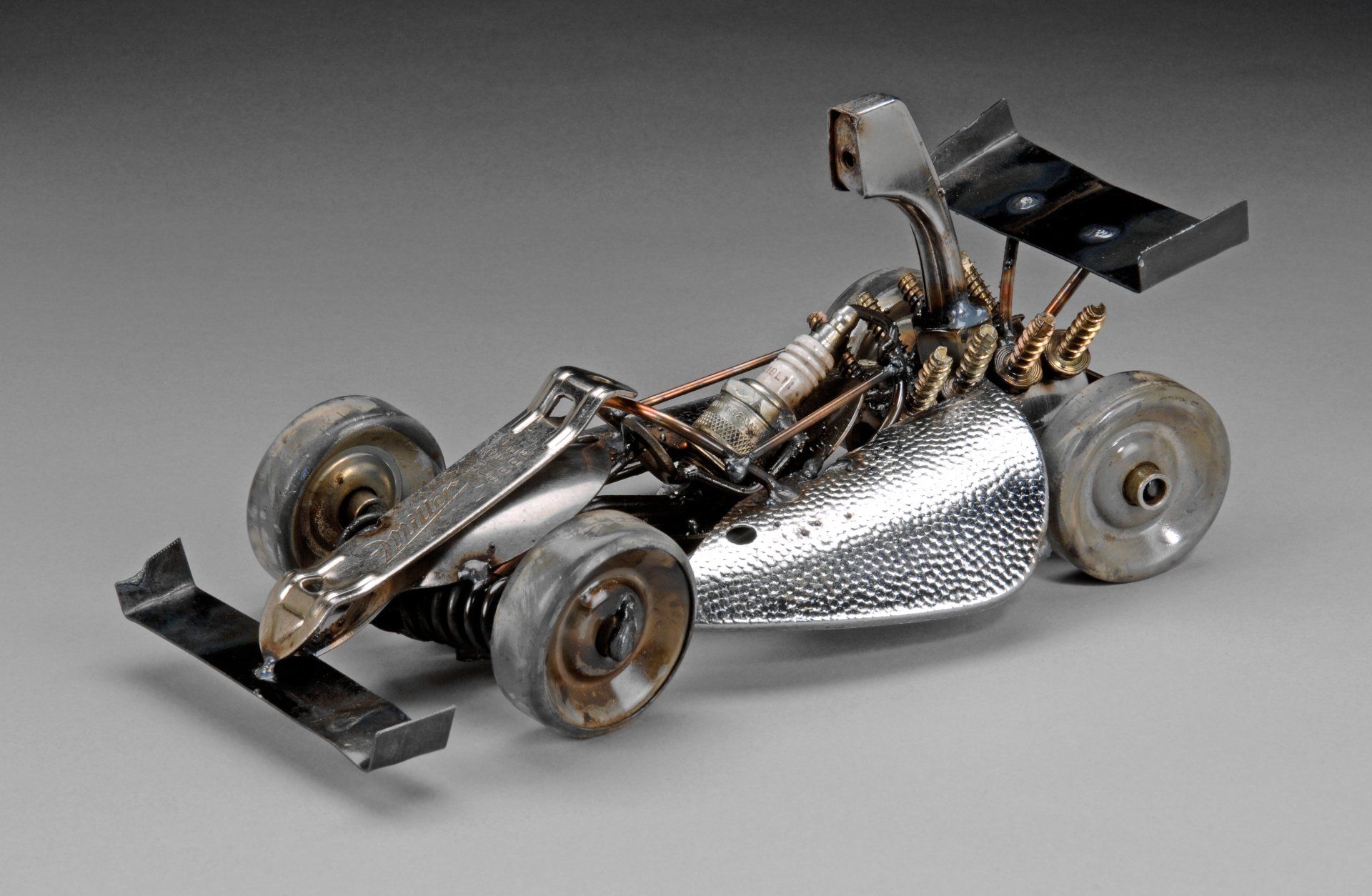 Sparkplug Sculpture of Formula One Race Car