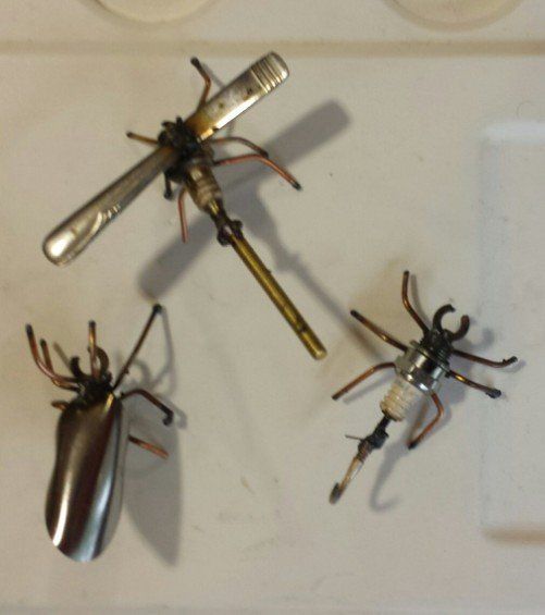 Sparkplug Sculpture of Bugs