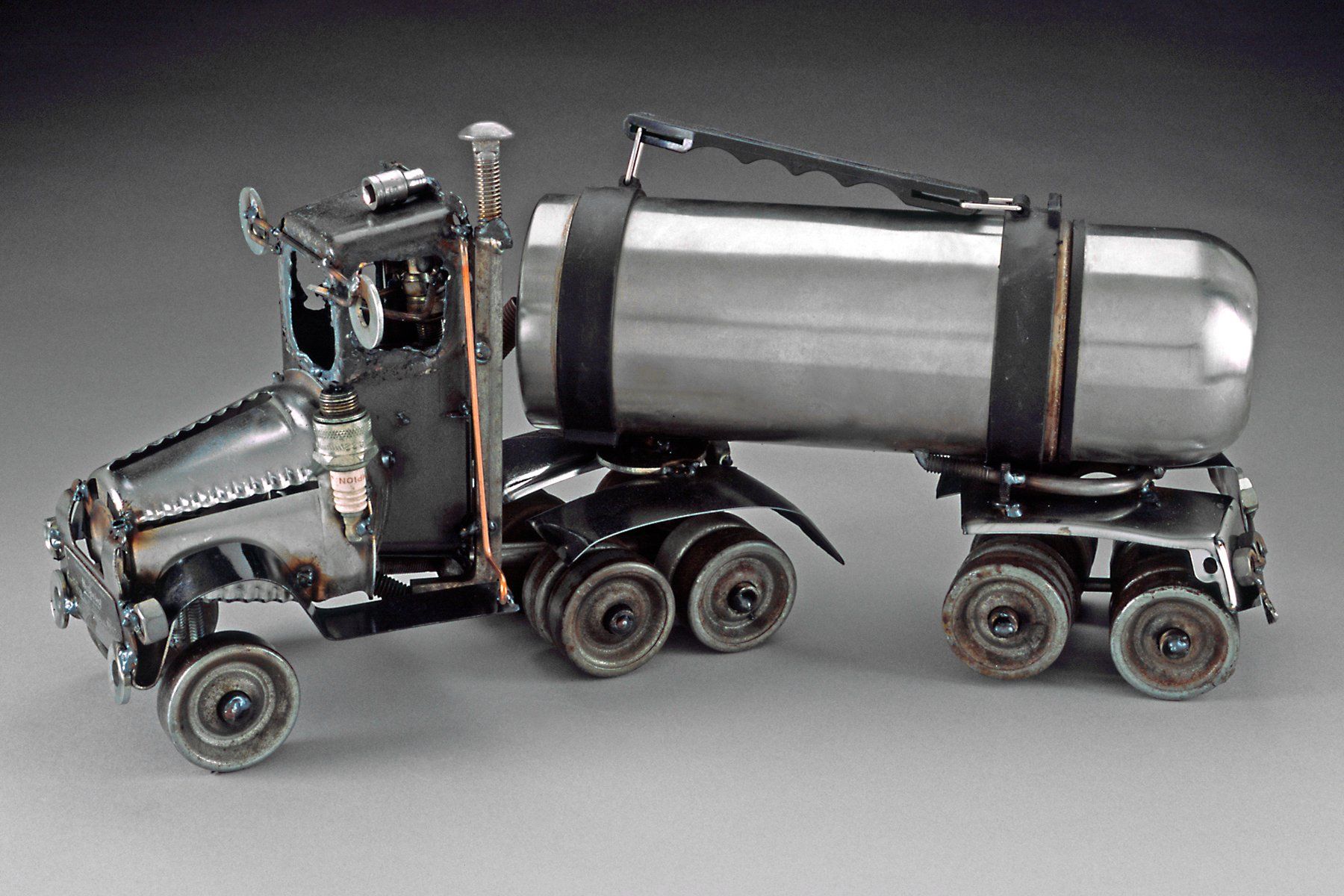 Sparkplug Sculpture of Tanker Truck thermos upcycled