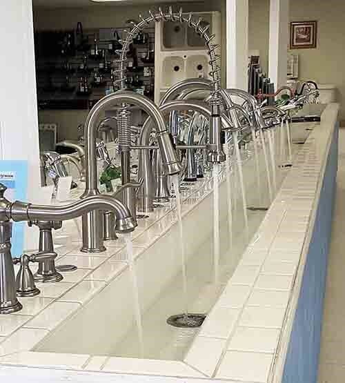 Faucet with water - D P Plumbing in Ottumwa, IA