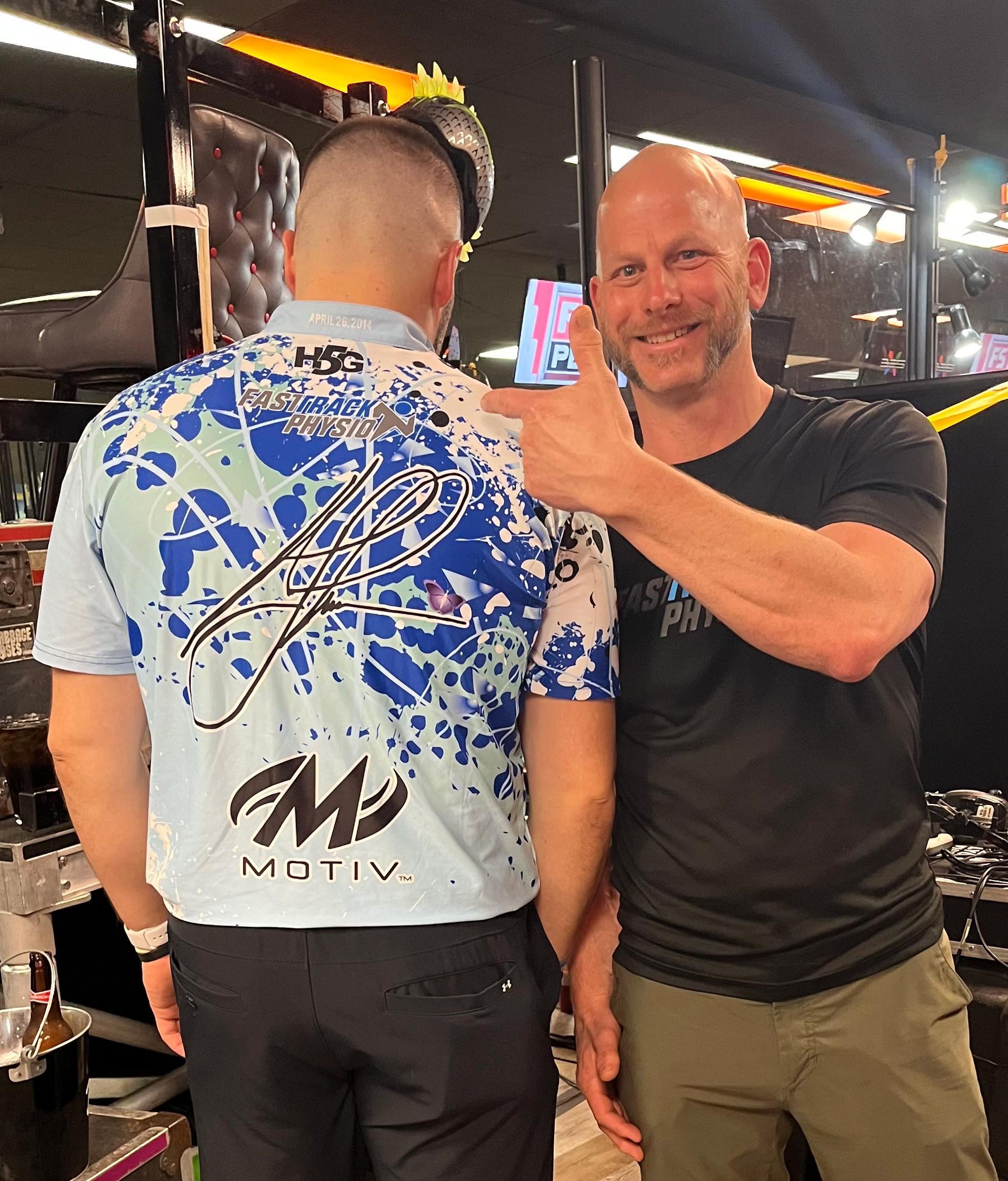 A Man Pointing His Finger To A Guy - Chicago, IL - Fast Track Physio