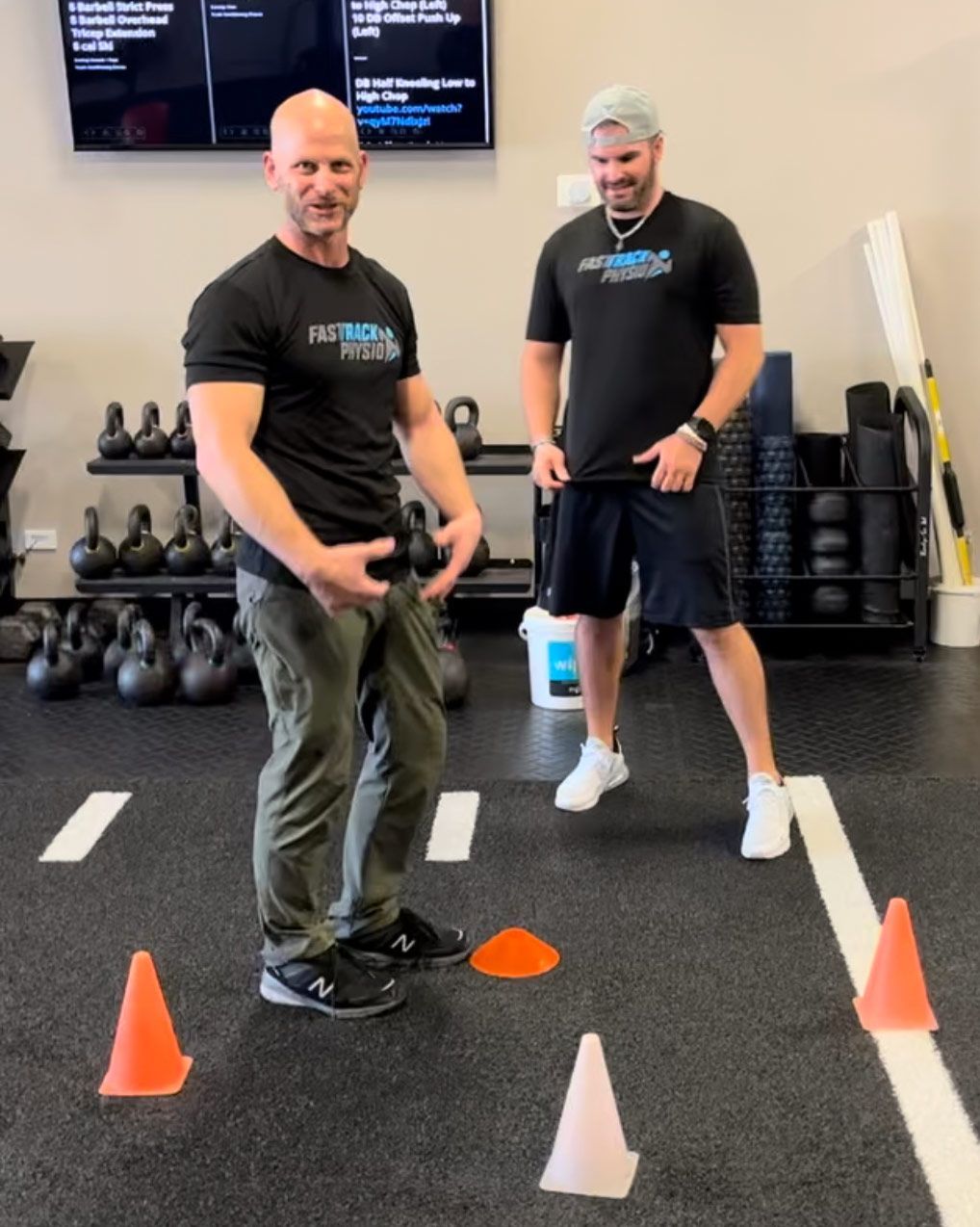 A Bald Guy Wearing Black Shirt - Chicago, Il - Fast Track Physio