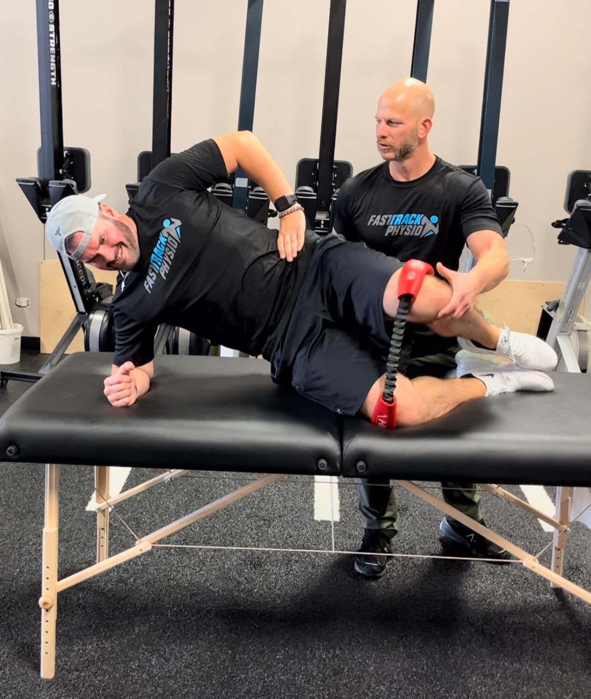 A Man Stretching His Leg On A Bench - Chicago, IL - Fast Track Physio