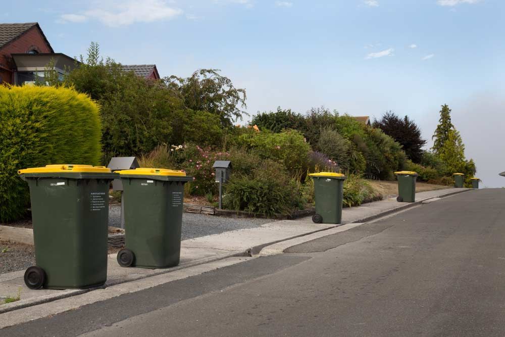 Wheelie Bin on Street Pathwalk — Waste Removal in Casino, NSW