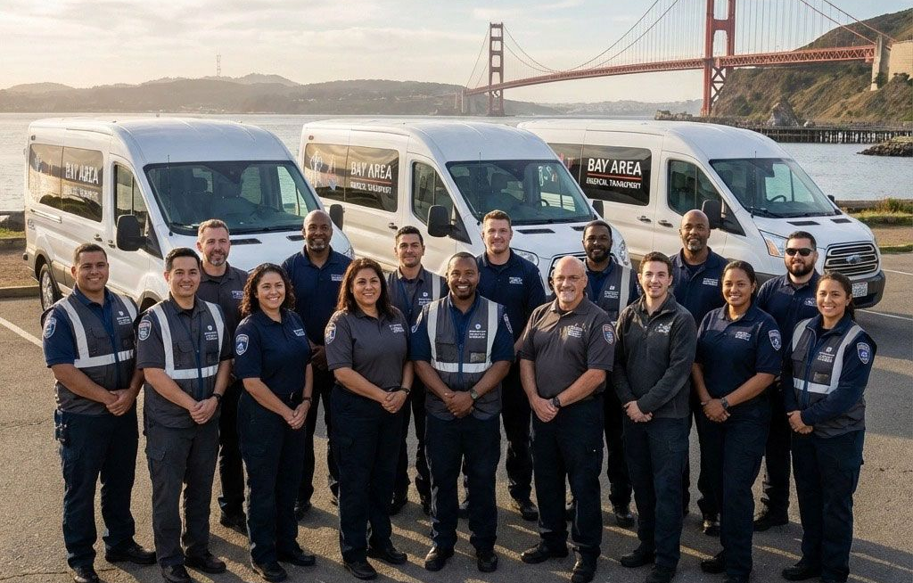 Group of people in uniform standing in front of vans and the Golden Gate Bridge.