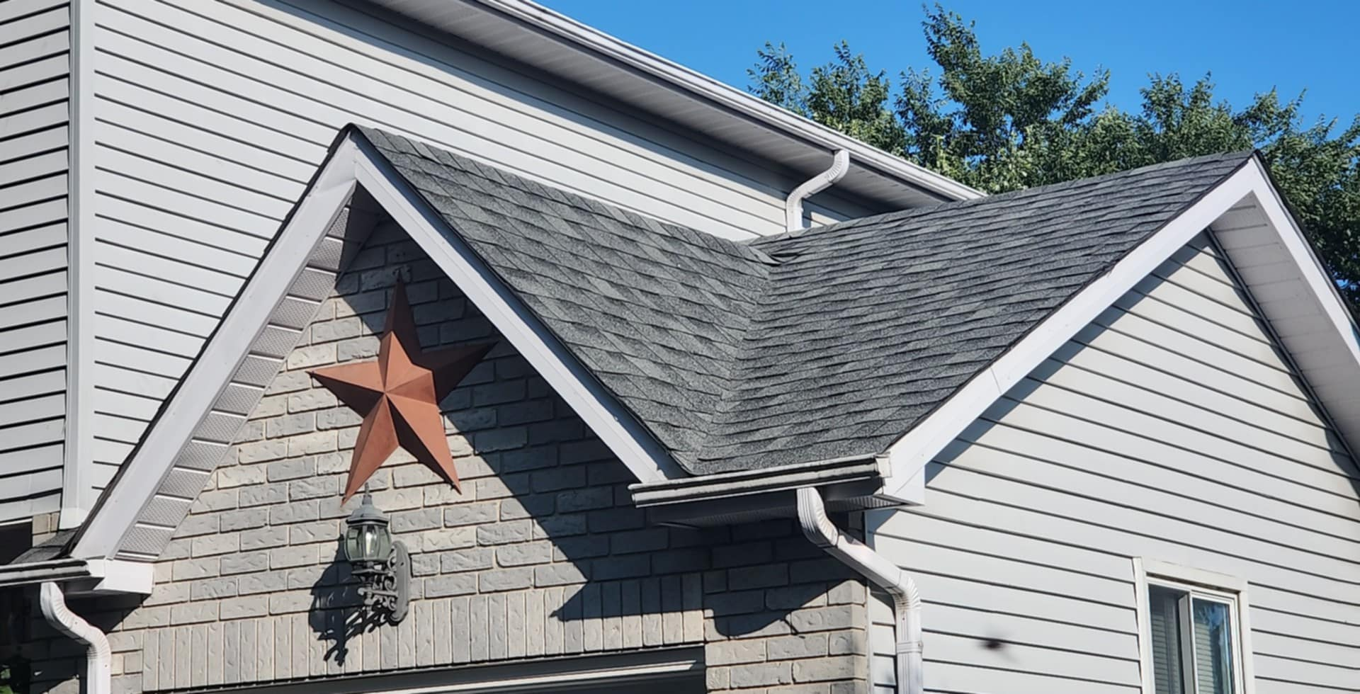 A house with a star on the side of it.