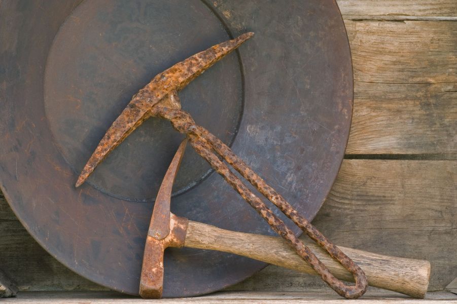 A sunset over a mountain range with a lot of fog