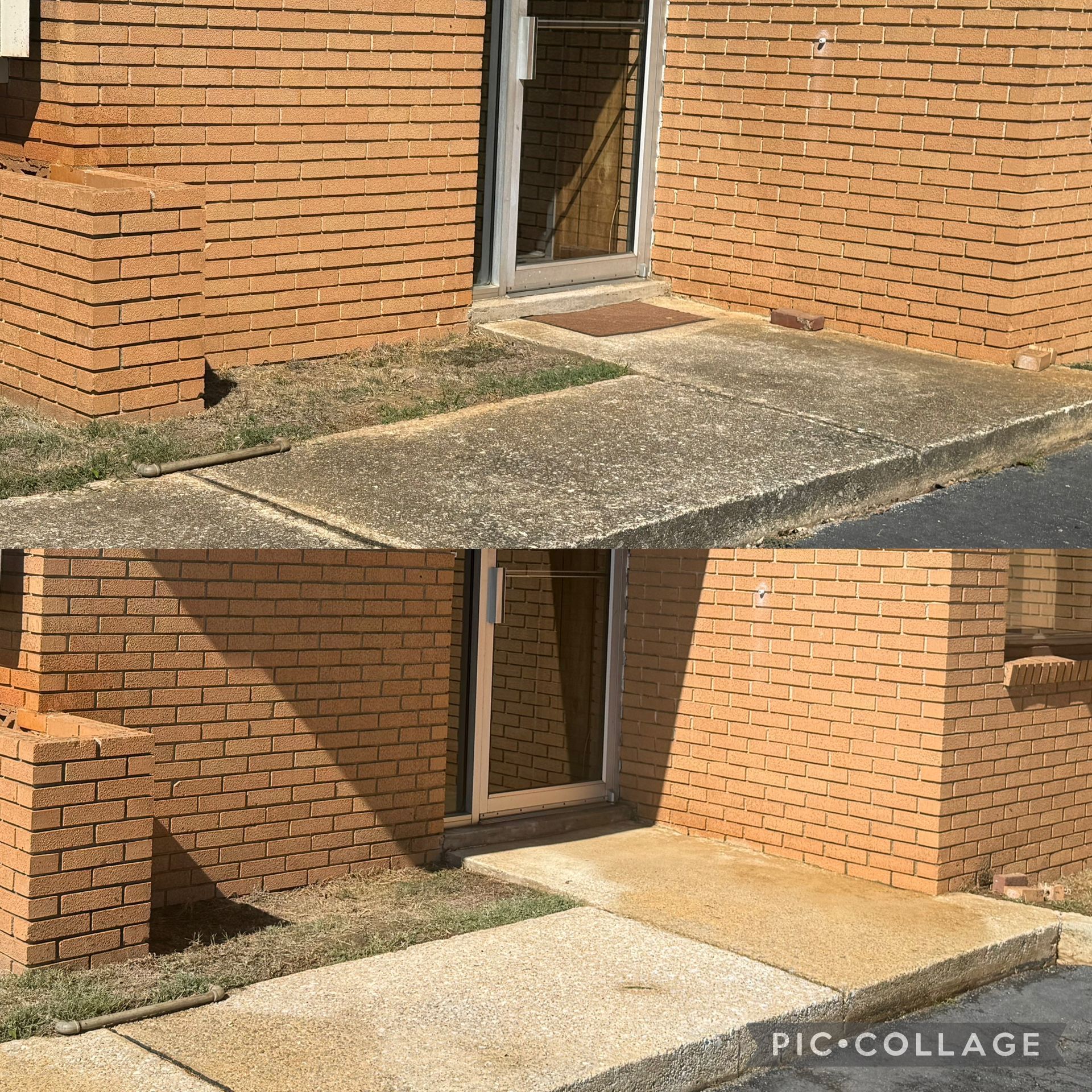 A brick building entrance with a concrete ramp and doorway.