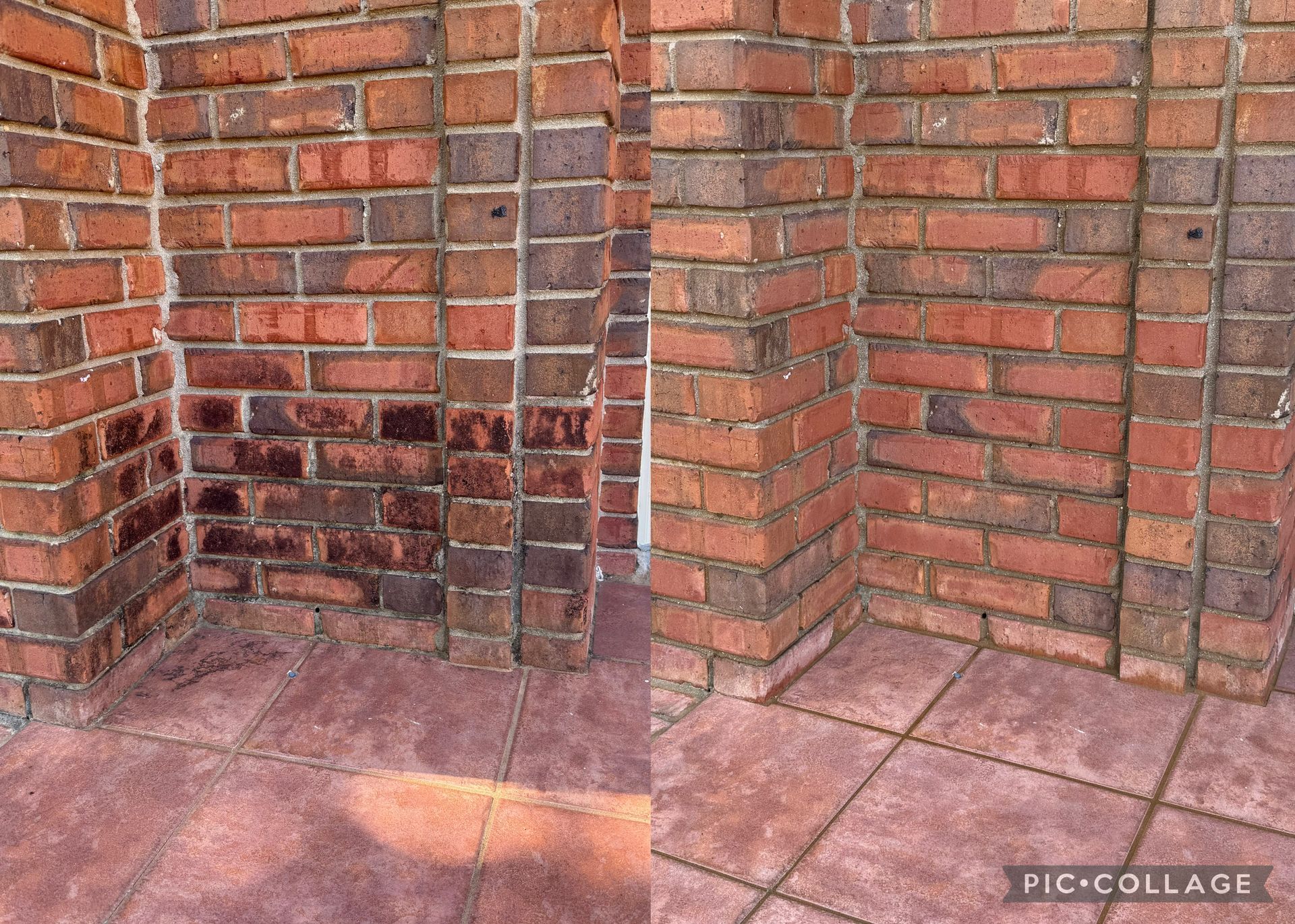 Brick wall corner, showing dark water stains on red bricks above red tile flooring.