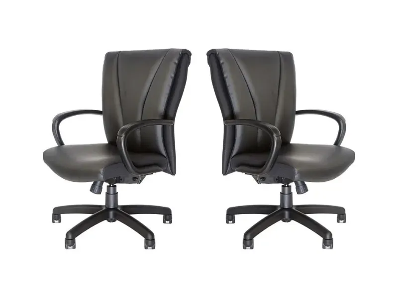 Two black office chairs with armrests and rolling bases.