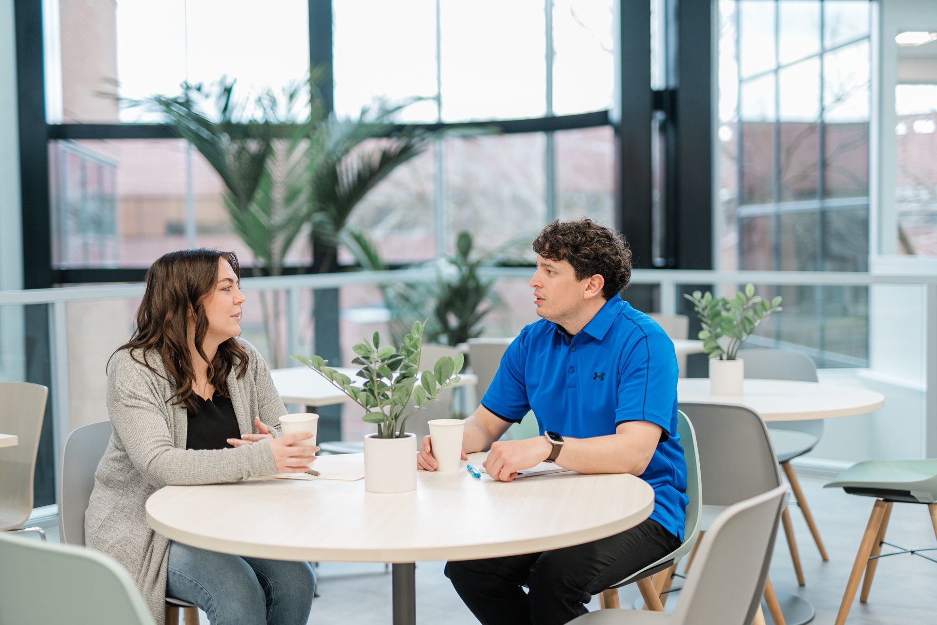 people at a table in the coworking space