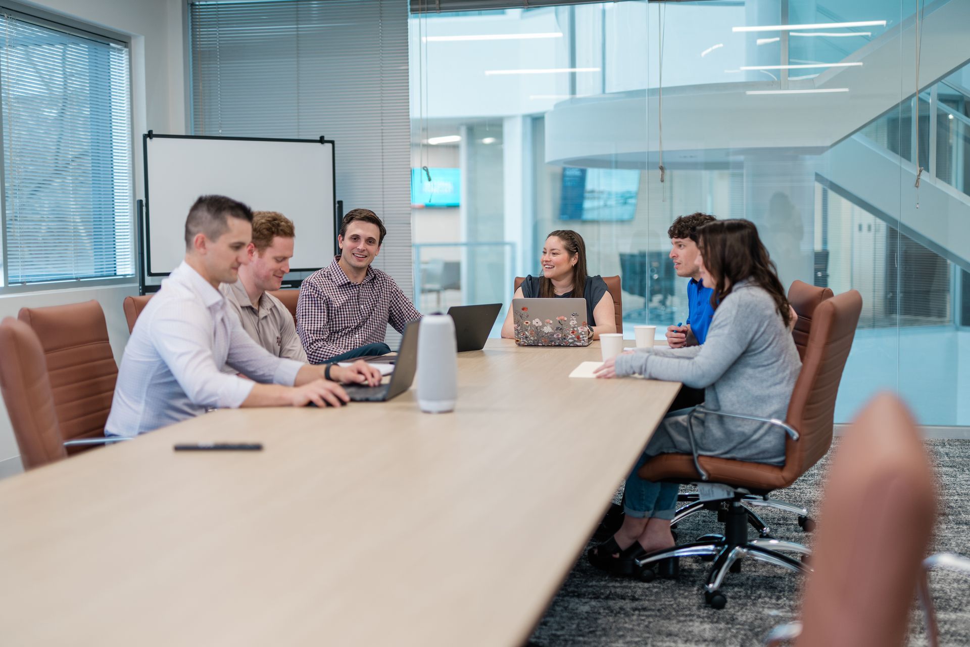 people in a large conference room