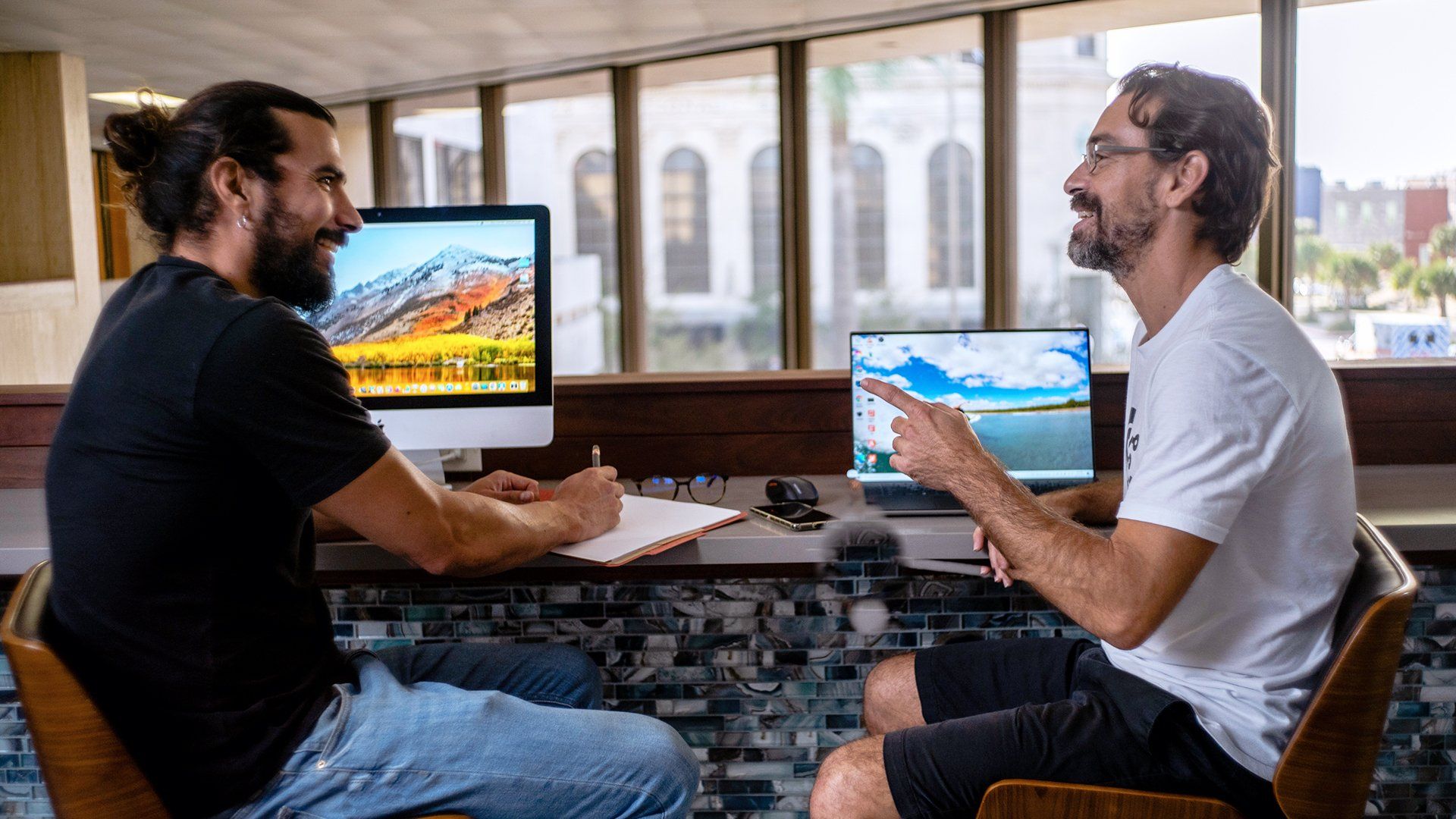 men working in a coworking space