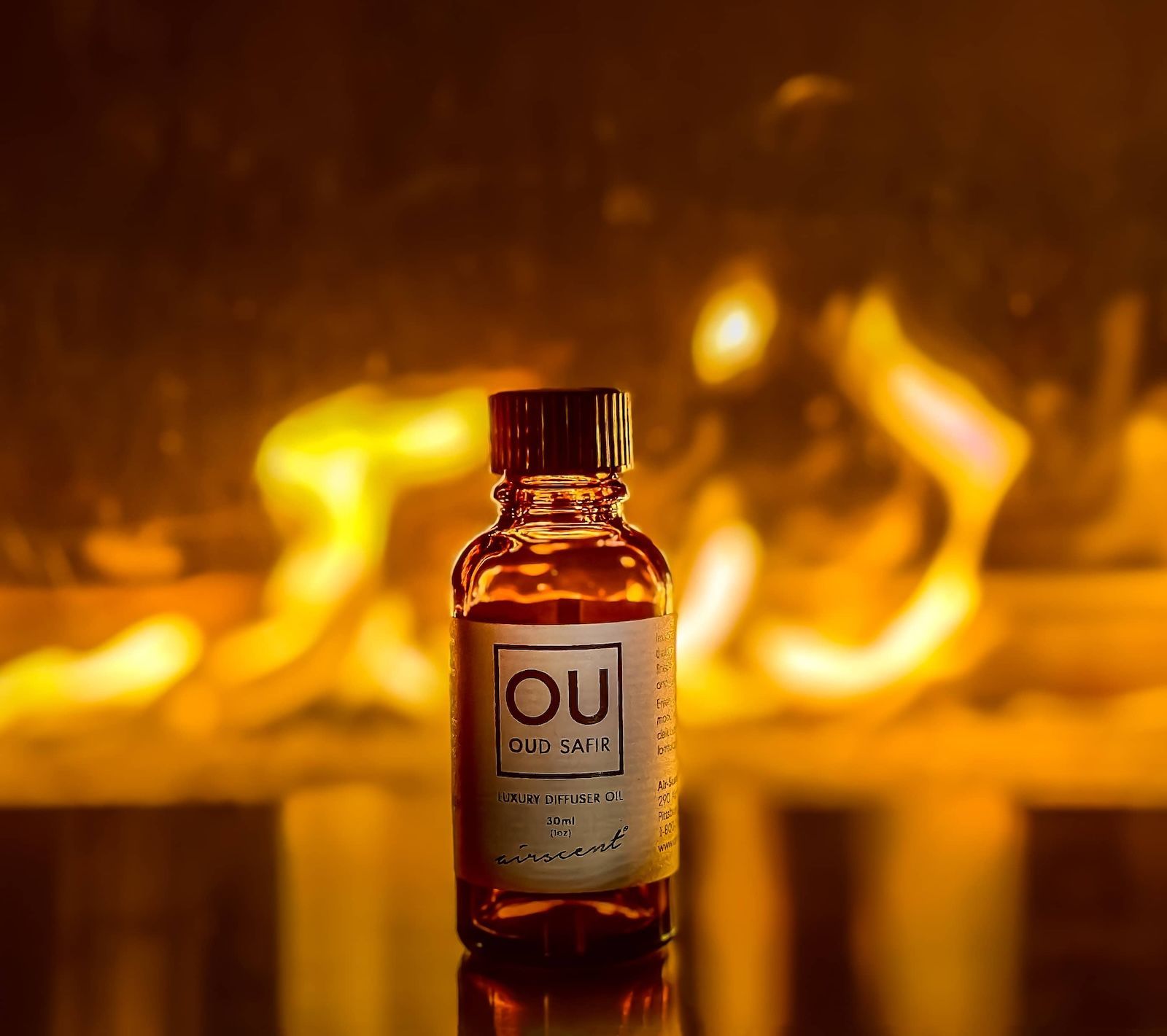 Oud Safir diffuser oil near fireplace