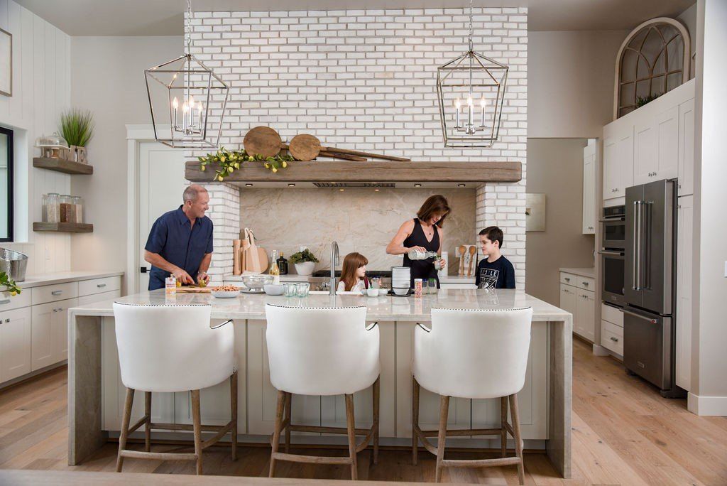 Family Cooking In Kitchen