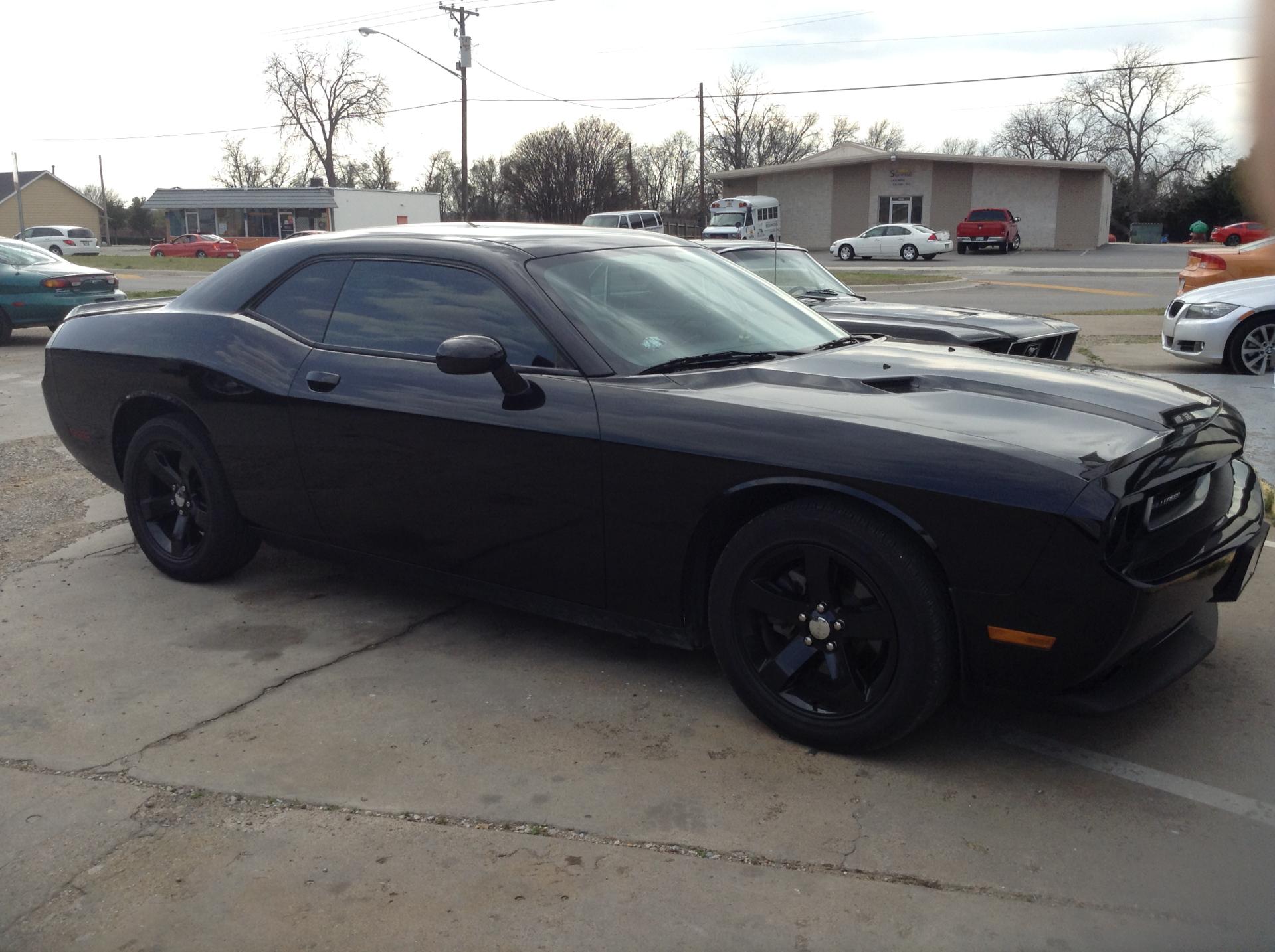 Black Car Parked With Other Cars — McKinney, TX — Auto Eclipse