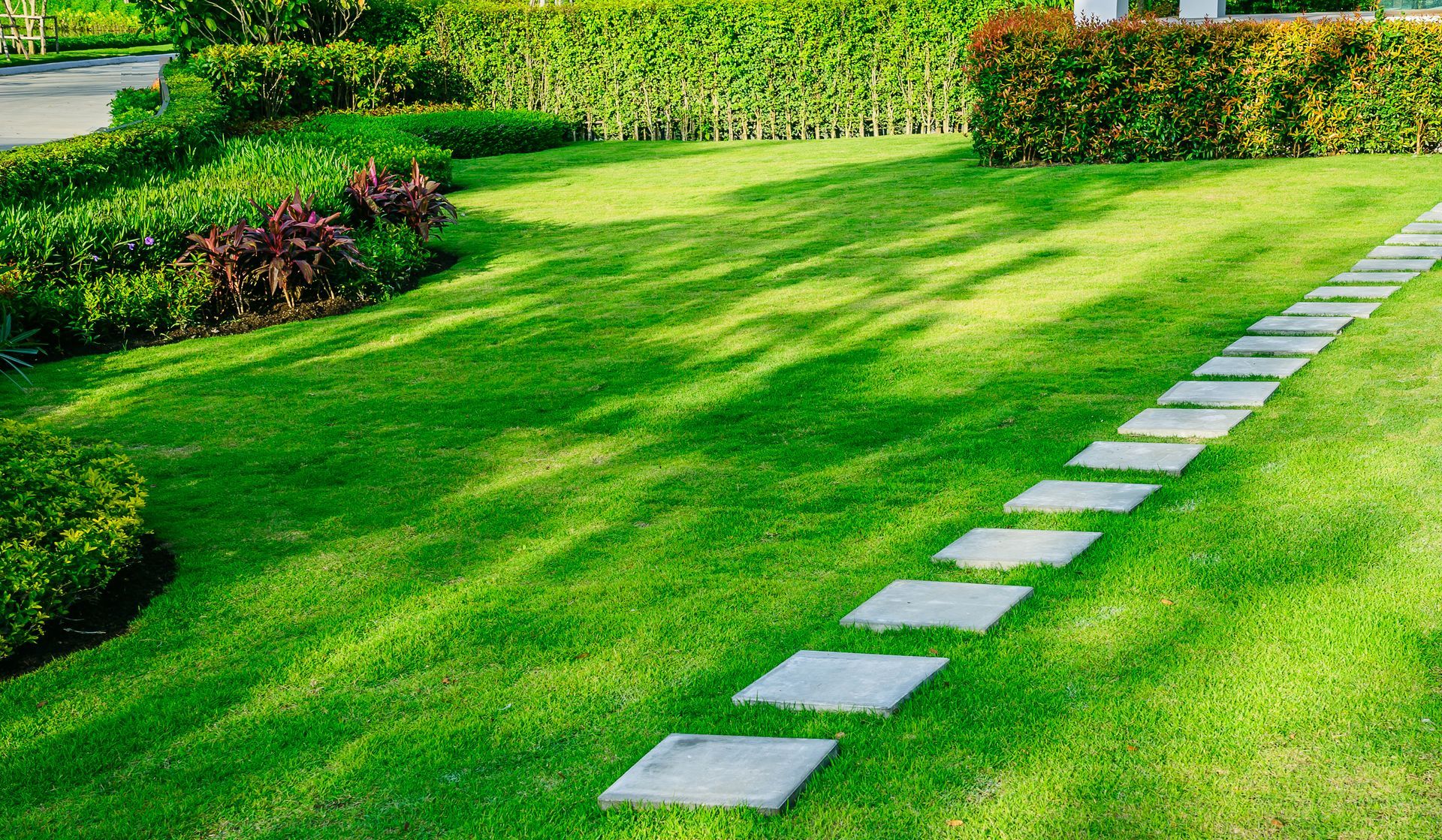 Clean Lawn with Stone Walkways