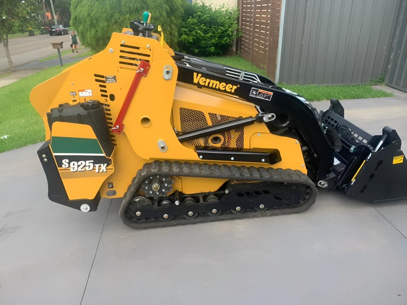 A Yellow Tractor Is Parked — R&J Cronin Equipment Hire in Lake Macquarie, NSW