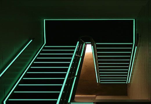 A set of stairs that are glowing in the dark