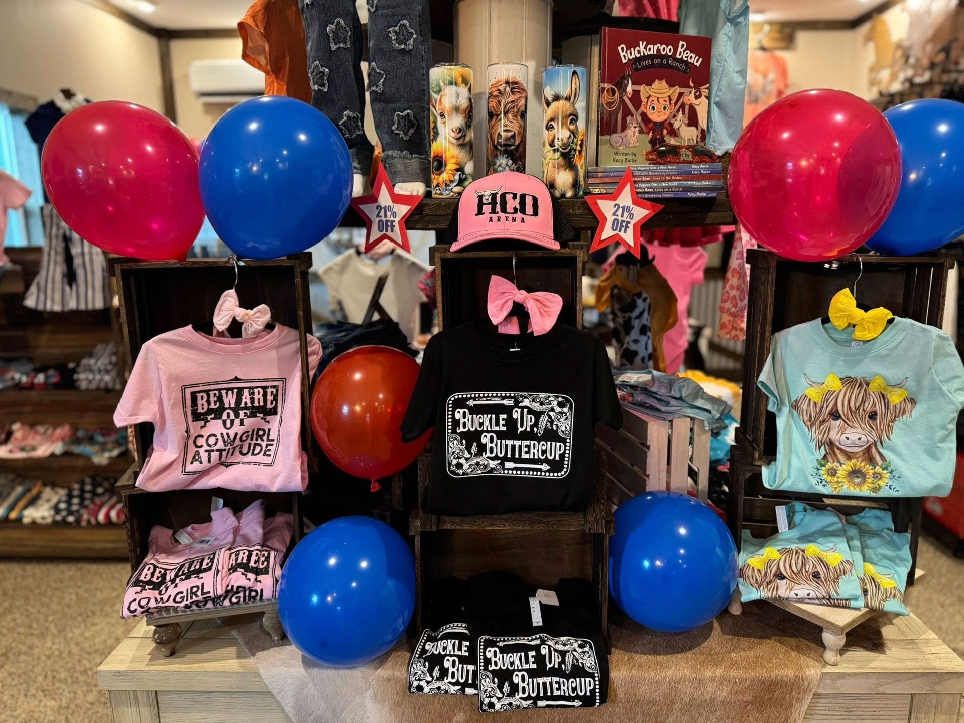 Clothing display with balloons