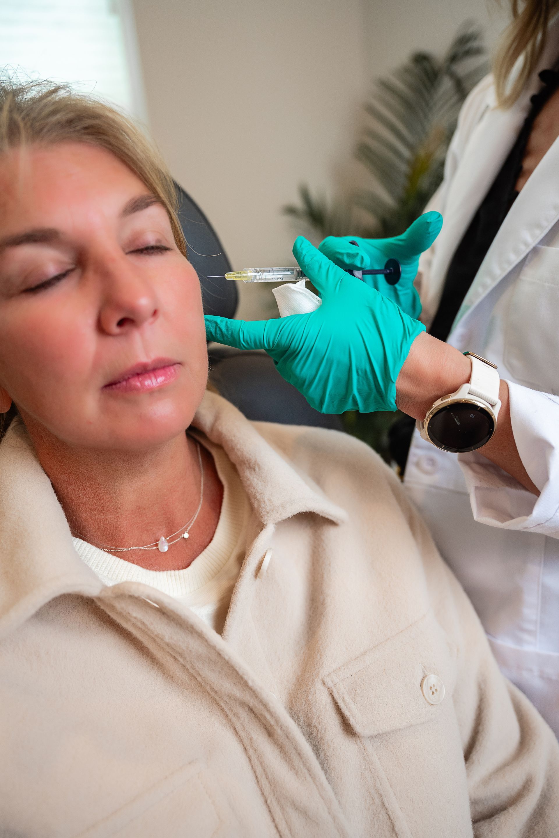 women getting cosmetic injection 