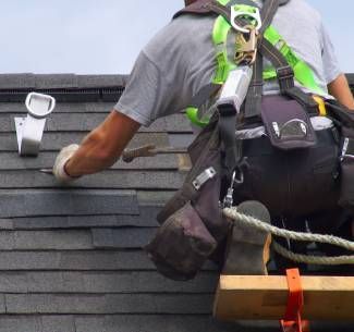 shingles being replaced on a roof 