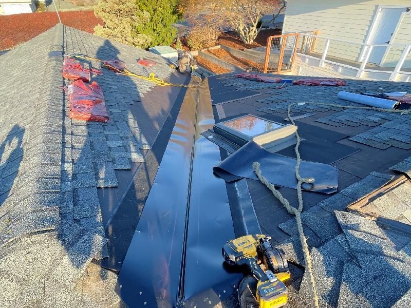 mess of roof being serviced