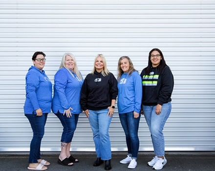 the women of Axis Roof & Gutter