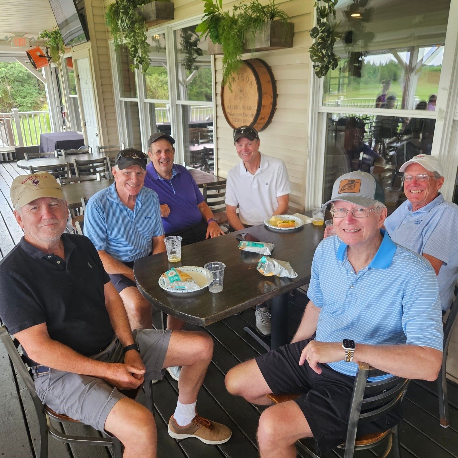 golfers enjoying the back deck at the remembering jamie golf tournament at mcculloughs golf course in egg harbor township new jersey