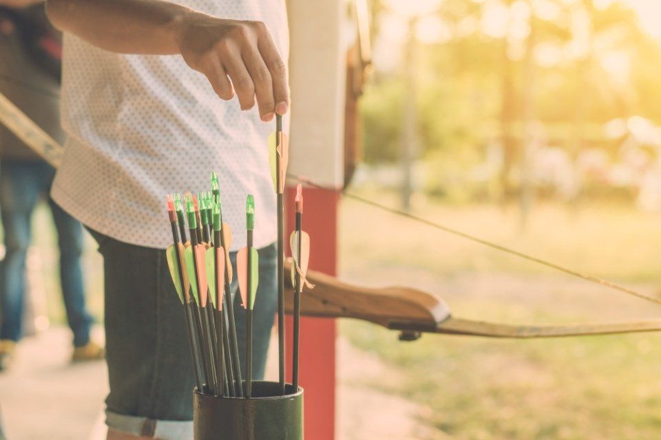 man taking out an arrow