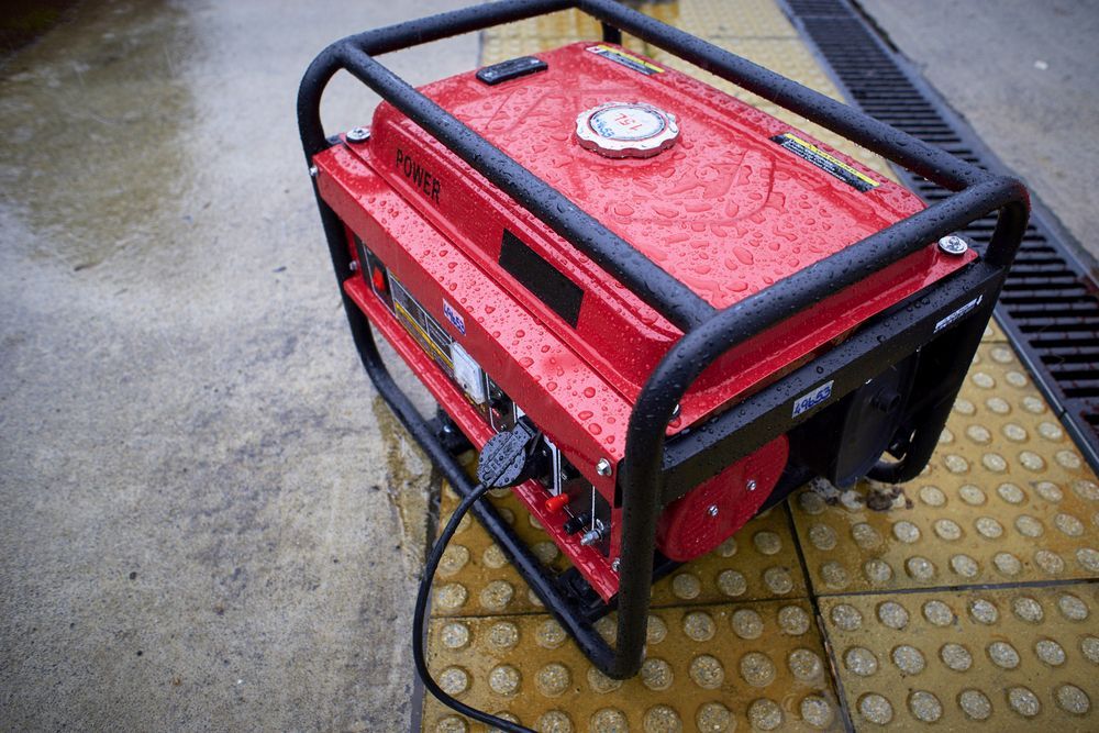 Red Generator With Black Frame, Sitting Outdoors — Coastcut Concrete Cutting Pty Ltd in Maitland,  NSW