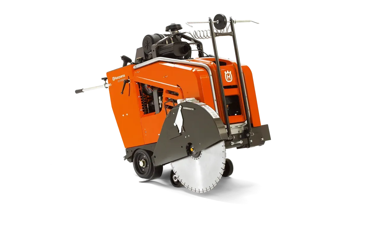 Orange industrial road saw with large circular blade on a white background