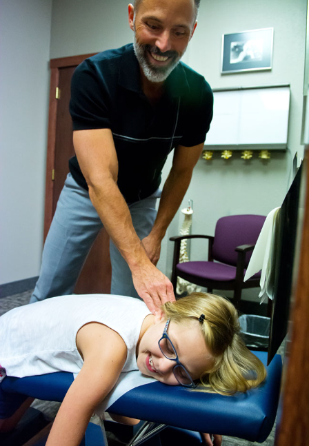 child getting a chiropractic adjustment
