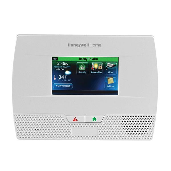 A honeywell home security system with a touchscreen