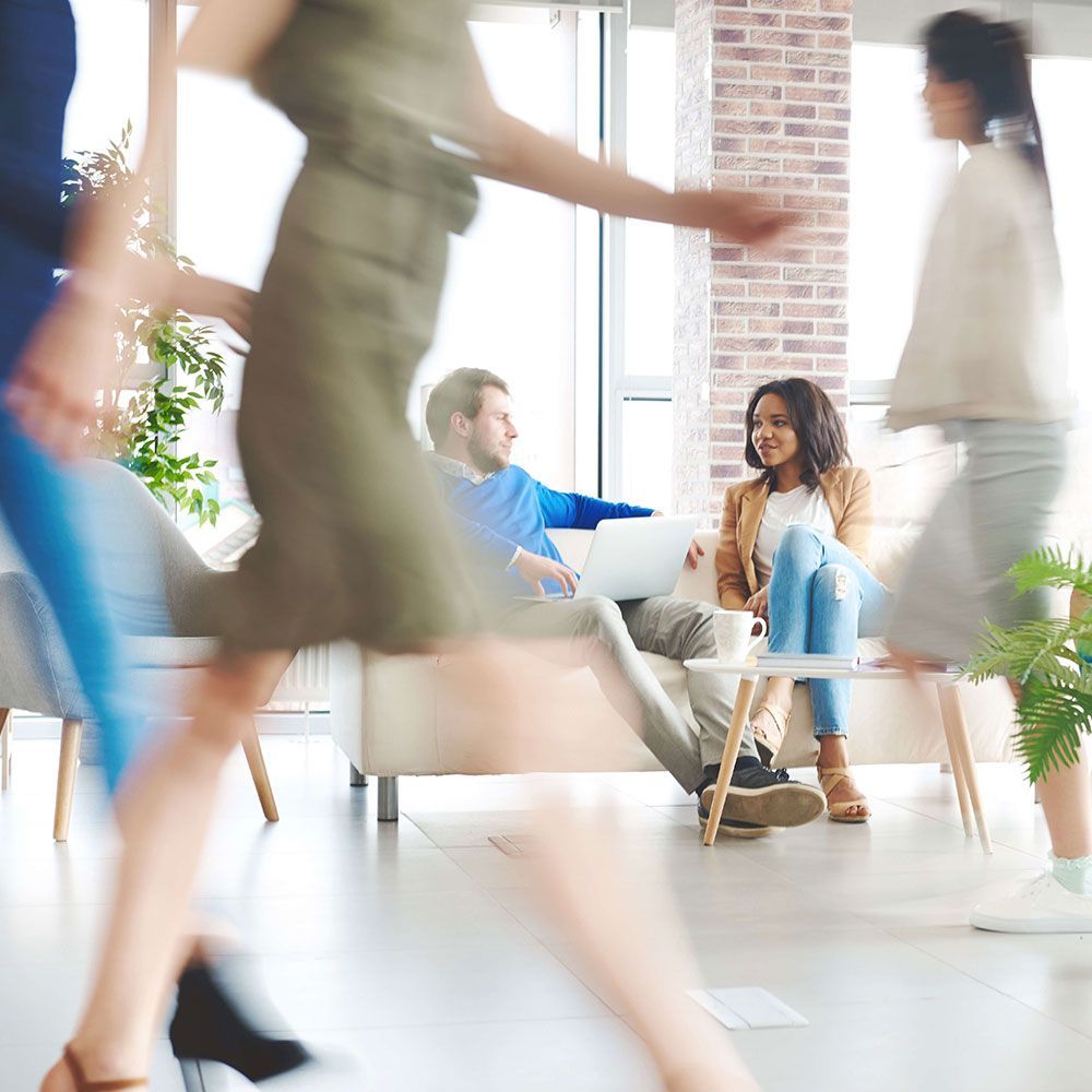 Three security cameras are sitting next to each other on a white background.