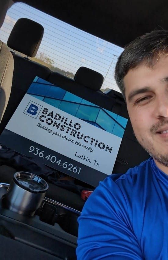 Man in a blue shirt with a 