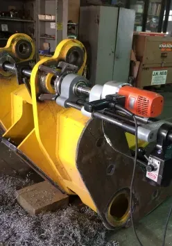 Man Inserting A Metal — Indianapolis, IN — Christie Machine Works