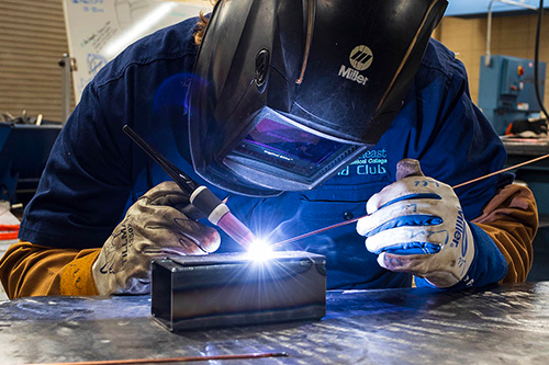 Worker Doing Metal Extension With Welding — Indianapolis, IN — Christie Machine Works