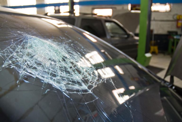 a windshield with cracks/broken