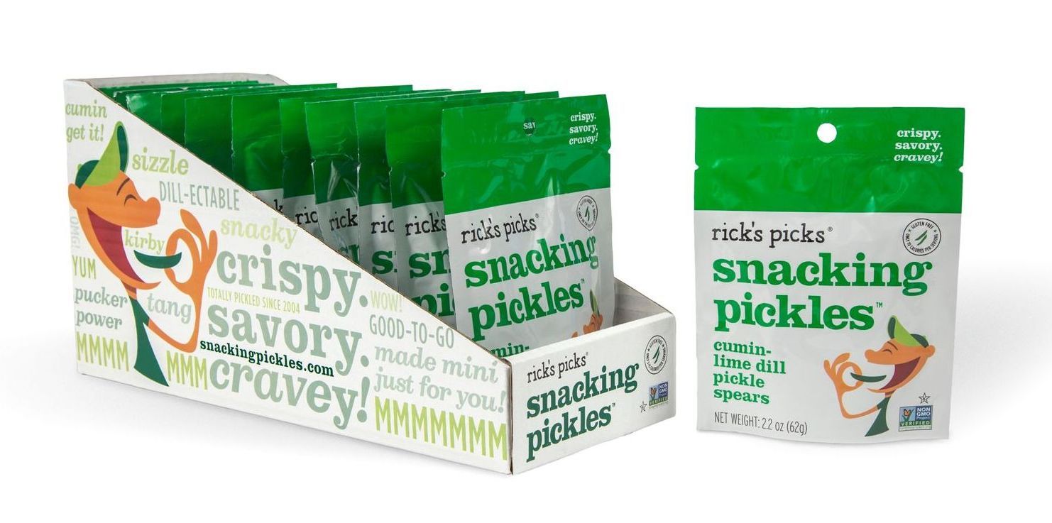 A box of snacking pickles next to a bag of pickles.