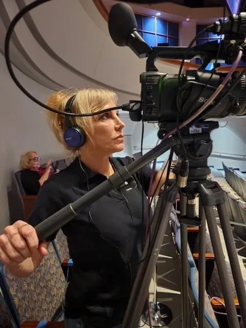 Woman Taking Video From Camera