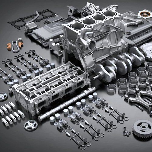 There Are Many Different Parts Of A Car Engine On The Table — P & M Performance & Mechanical In Bungalow, QLD