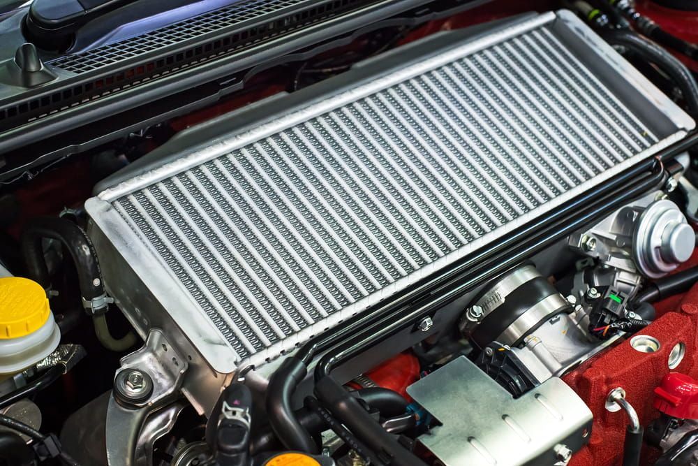 A Close Up Of A Car Engine With A Radiator — P & M Performance & Mechanical In Bungalow, QLD