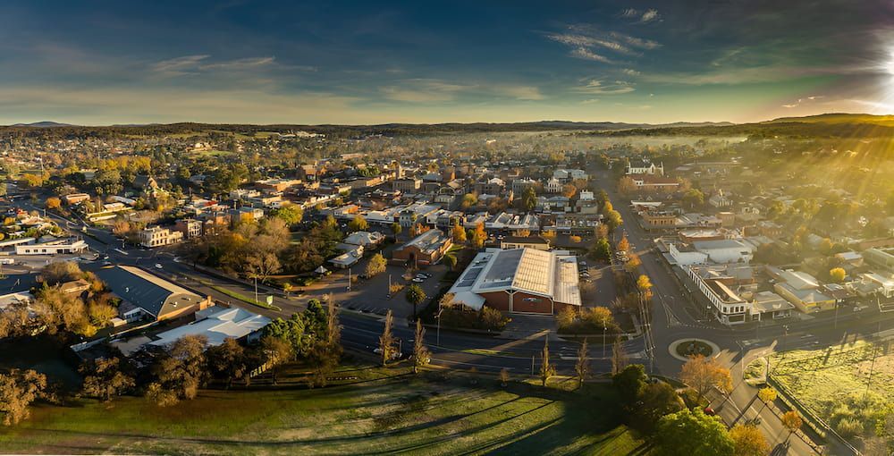 An Aerial View Of A Small Town At Sunset — Justin Drew Plumbing in Grovedale, VIC
